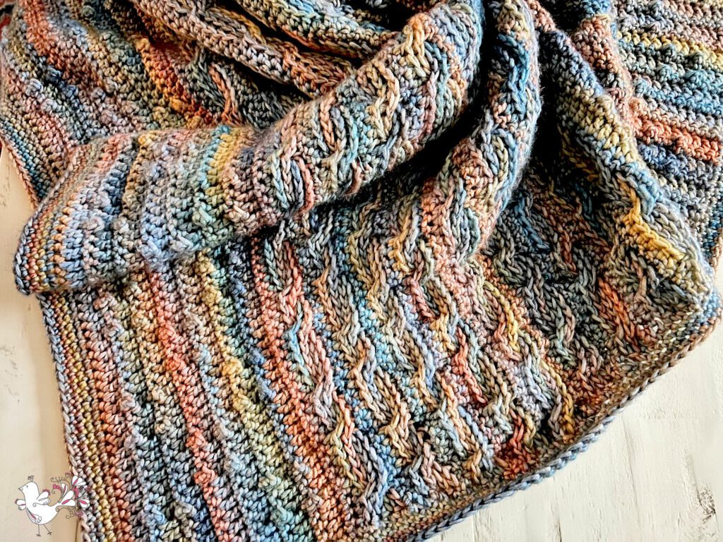 Sandwellen Textured Crochet Blanket Pattern with Caron Blossom Cakes - by Marly Bird