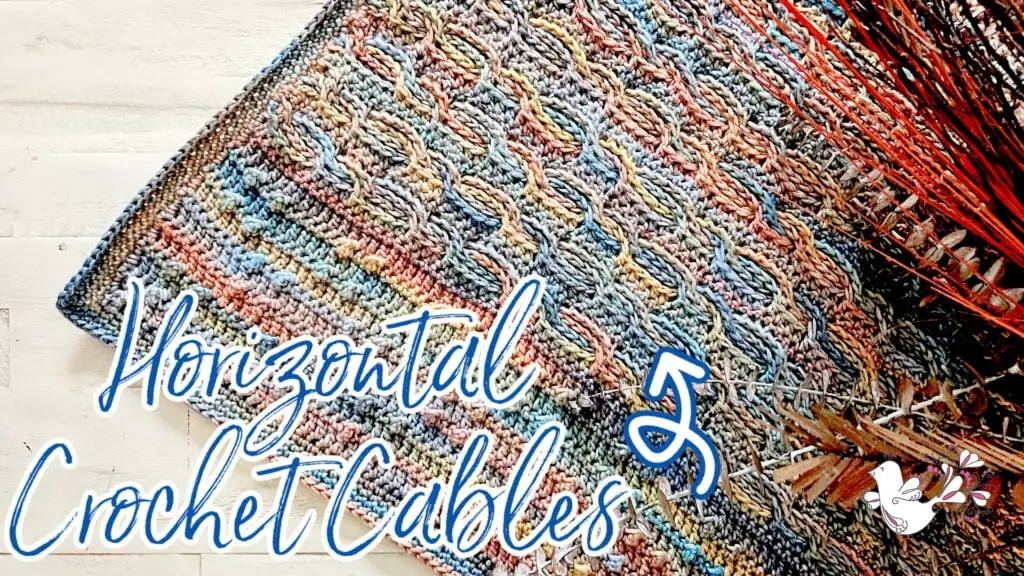 A multicolored crocheted fabric with horizontal cable patterns is displayed on a white wooden surface. Decorative dried plants are in the corner. Text reads "Horizontal Crochet Cables" with a yarn and hook graphic. -Marly Bird