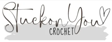 Handwritten-style text reads “Stuck on You Crochet” with a heart shape at the end, over a gray paint-like brushstroke background—perfect for celebrating the 24 days of quickies. -Marly Bird