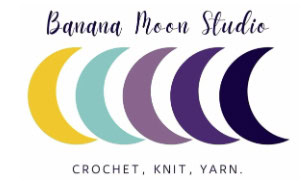 Logo for Banana Moon Studio featuring five crescent moons in yellow, aqua, lavender, purple, and navy, with the text "Banana Moon Studio" above and "CROCHET, KNIT, YARN." below—perfect for 24 days of quickies projects. -Marly Bird