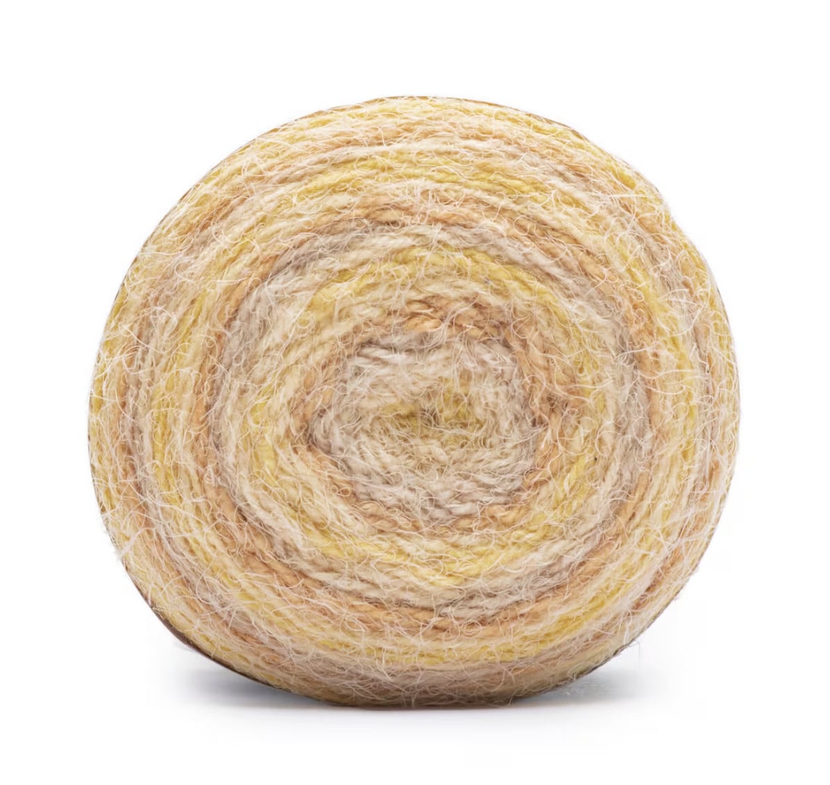 Close-up of a rolled skein of yarn in cream, beige, and yellow with a soft texture, ideal for knitting cozy ponchos.