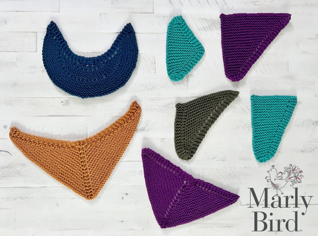 Crochet and knitting swatches in various shapes, featuring dark blue, teal, purple, and orange yarn.