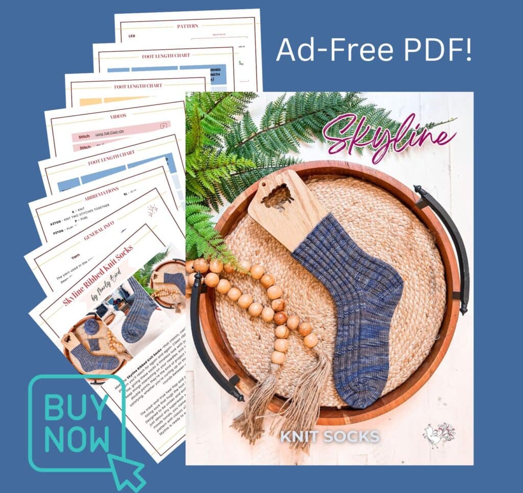 A promotional image for the Skyline Ribbed Knit Socks PDF pattern, featuring a blue ribbed knit sock on a wooden tray, printed pattern pages, and a "Buy Now" button on a blue background—perfect your next socks with this ribbed knit socks pattern. -Marly Bird