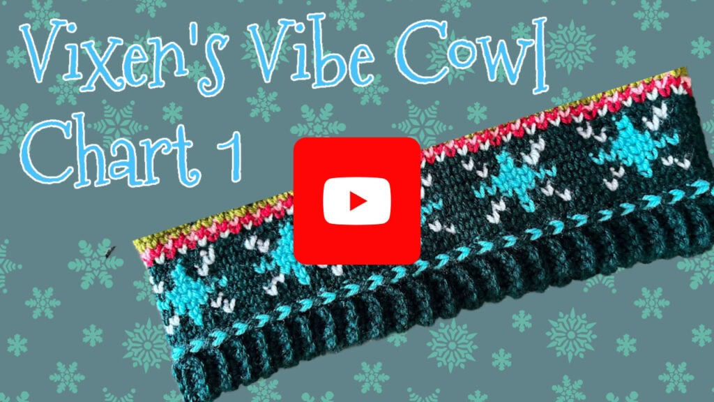 A colorful knitted cowl with teal, white, and pink patterns is displayed on a blue snowflake background. The text reads "Vixen's Vibe Crochet Cowl Chart 1" with a YouTube play button icon centered over the cowl. -Marly Bird