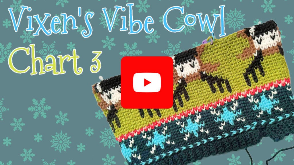 A colorful crochet cowl featuring reindeer and geometric patterns is displayed on a blue background with snowflakes. Large text reads "Vixen’s Vibe Cowl Chart 3," with a YouTube play button overlaying the center. -Marly Bird