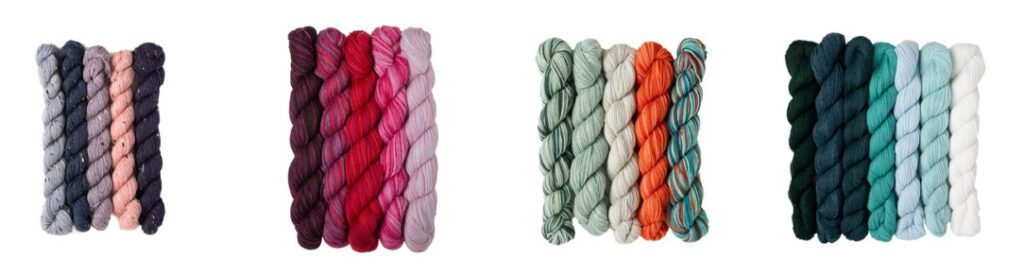 Four sets of colorful, twisted yarn skeins are arranged in rows. Each set features five skeins in various colors, including shades of blue, pink, red, gray, orange, green, and teal, against a white background. -Marly Bird