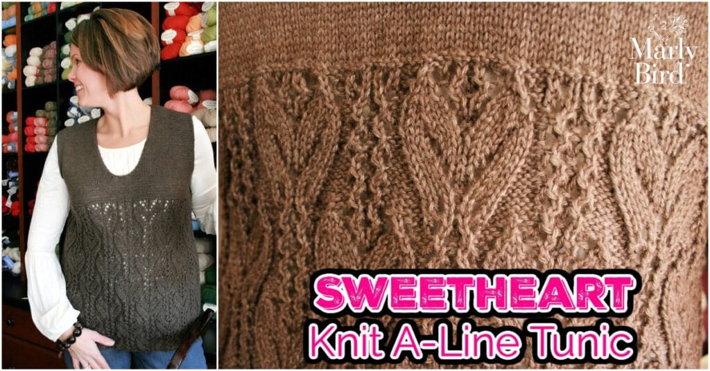 A woman stands in front of yarn shelves wearing a brown Marly Bird A-Line Tunic with a textured heart pattern. Close-up shows the detailed knitting. Text reads: “SWEETHEART Knit A-Line Tunic – Free Knit Tunic Pattern.”. -Marly Bird