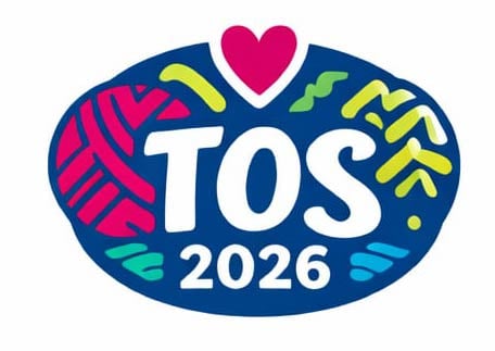 Dark blue oval logo with bold white "TOS 2026," vibrant red, green, yellow accents, and a pink heart above.