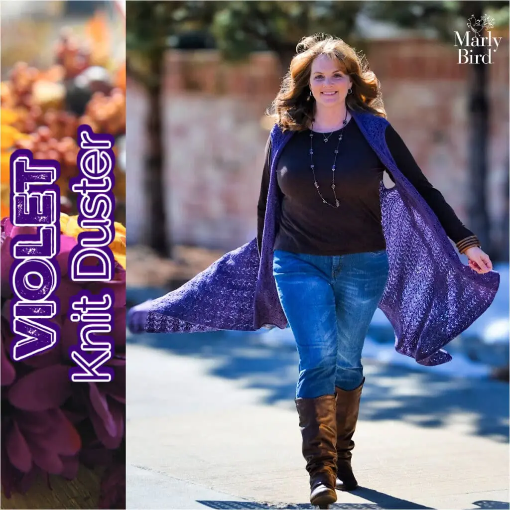 Woman models a knitted violet duster vest with open front, textured stitch details, and flowing drape over jeans and boots.