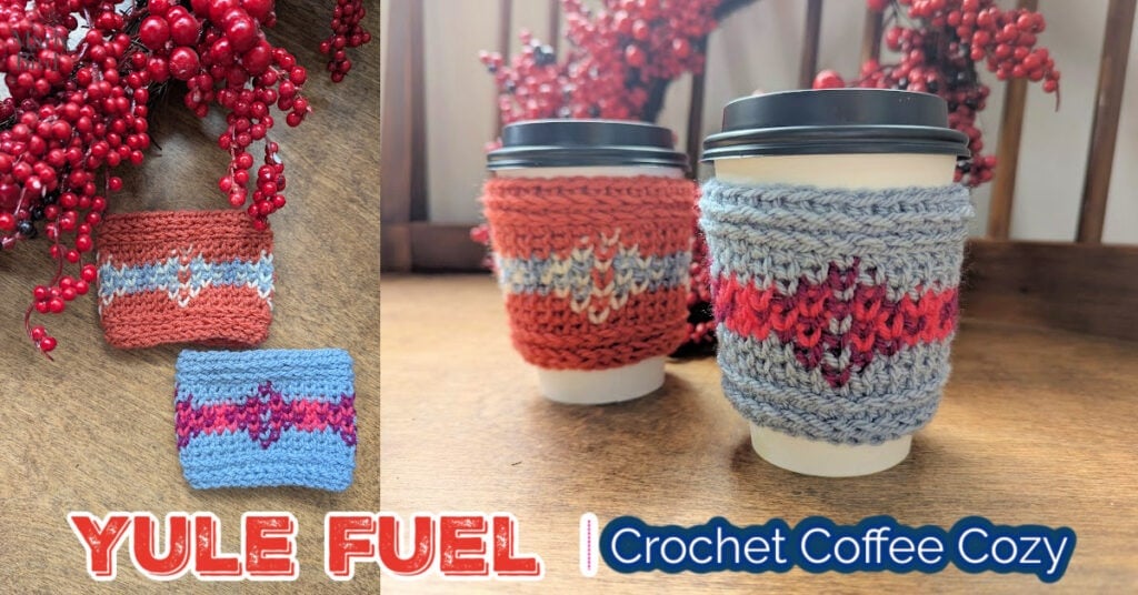 Red and blue crochet cup cozies with diamond patterns wrapped on mugs; textured yarn, red berries accent the wooden surface.