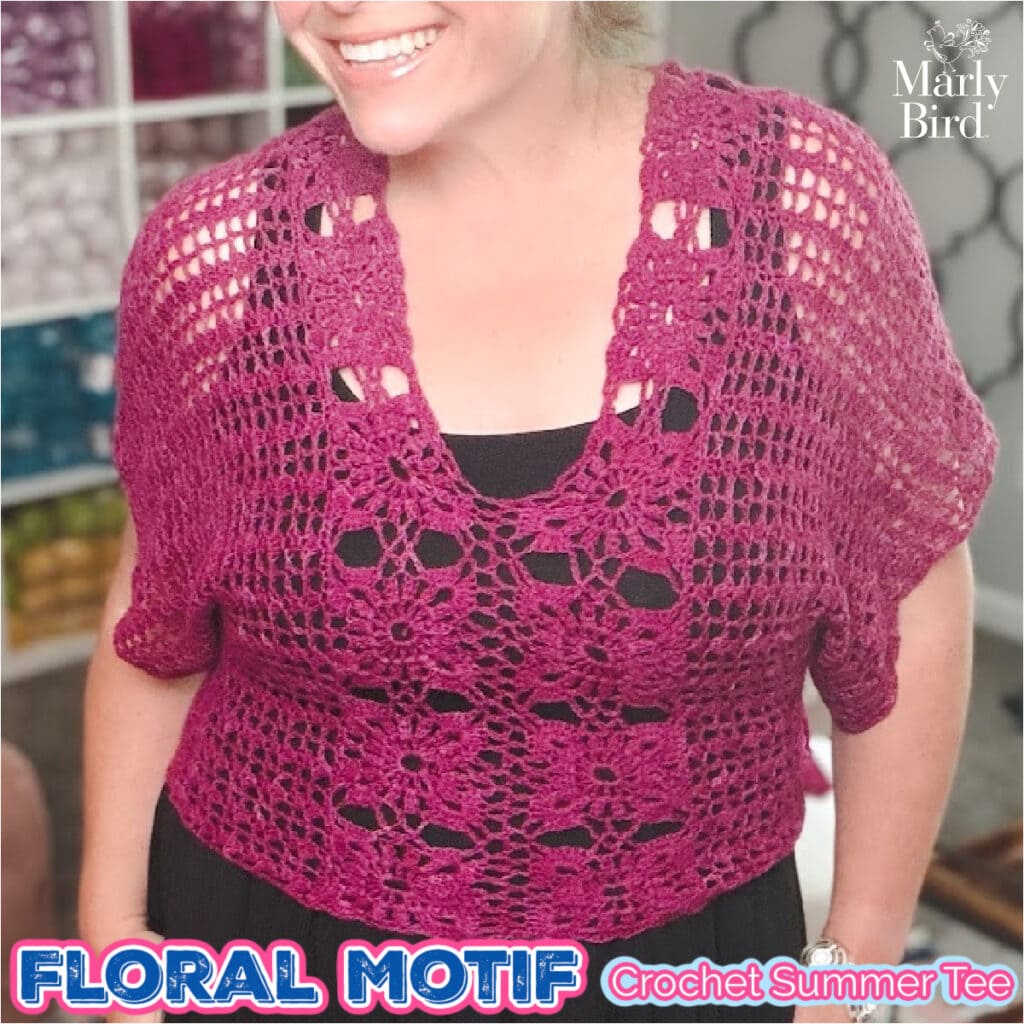 Free crochet floral motif tee pattern in purple, styled over a black maxi dress — lacy summer crochet sweater