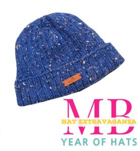 Every Day Knit Hat in Cobalt Blue laying flat on a white background - text that has MB Hat Extravaganza Year of Hats - Marly Bird